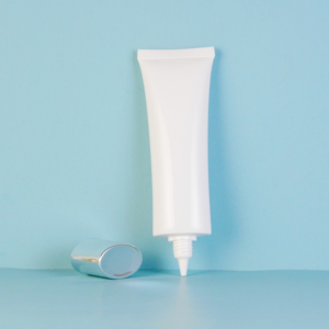 flat oval squeee tube with removeable nozzle and silver cap