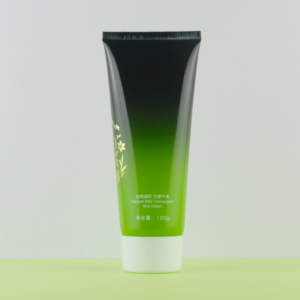 Green plastic lotion packaging tube with white screw cap, black gradient printing