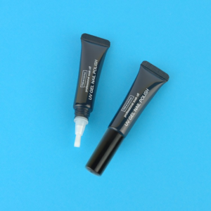 black nail polish squeeze tube with brush